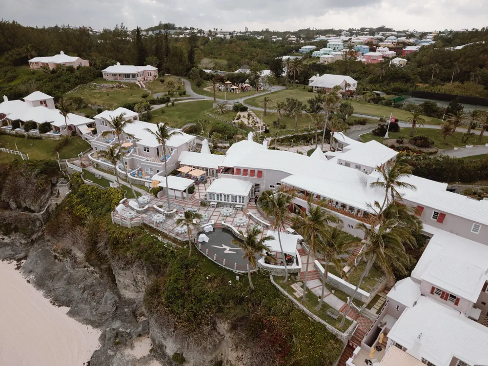 Aerial view of a clifftop estate above the sea